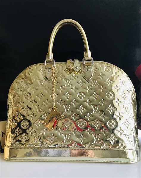 louis vuitton alma miroir|Louis Vuitton Alma handbag.